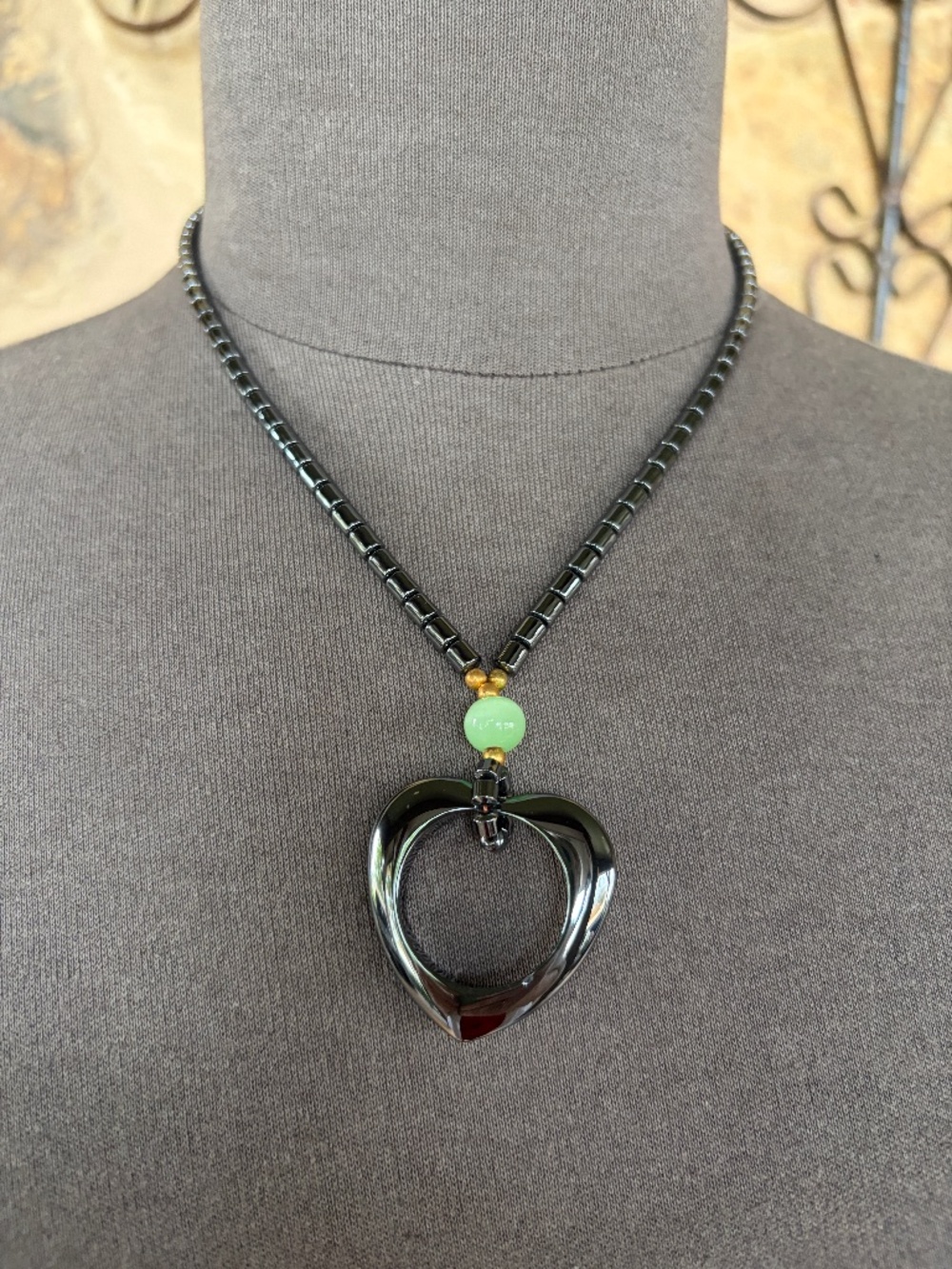 Hematite Heart-shaped Stone Beaded Necklace with Jade Accent Bead and Barrel Cla